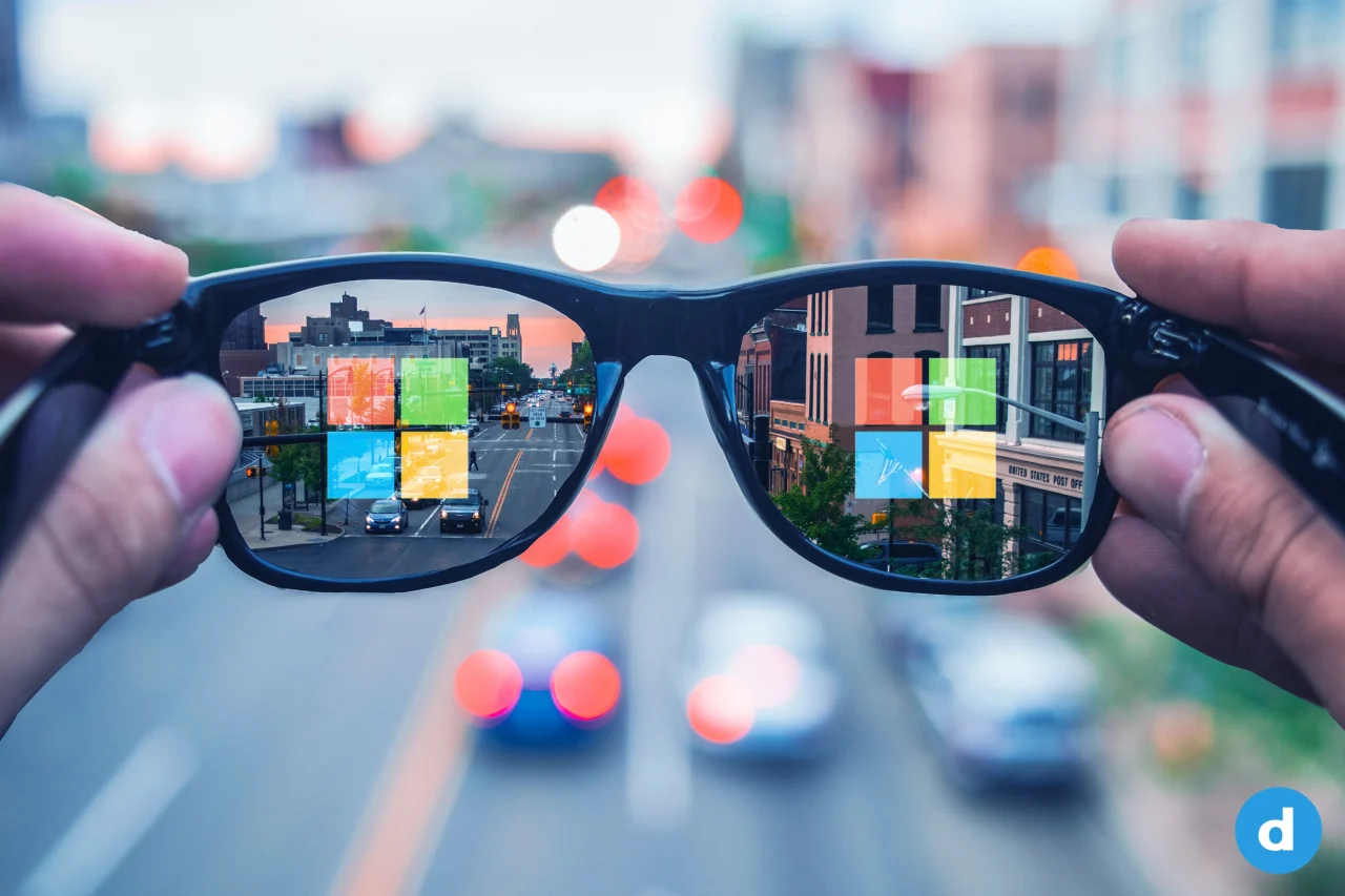 The Microsoft logo is reflected in sunglasses