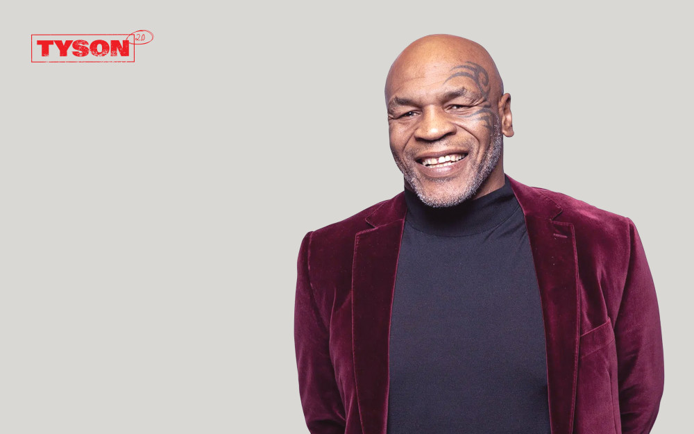 Tyson 2.0 brand image. Mike Tyson smiling.