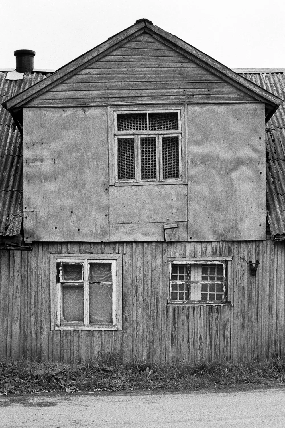 Old window with a view that invites wonder about its past stories