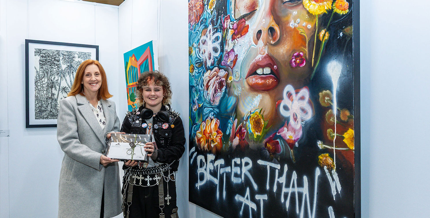 From L to R: Mayor Ruth Butterfield , and Grayson from Armadale Senior High School – winner of the Local Artist award, with the artwork Better than AI