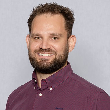 Headshot image of Cameron Ellis