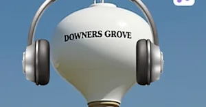 a photo of the Downers Grove, Illinois water tower with an iPhone’s headphones icon photoshopped next to it