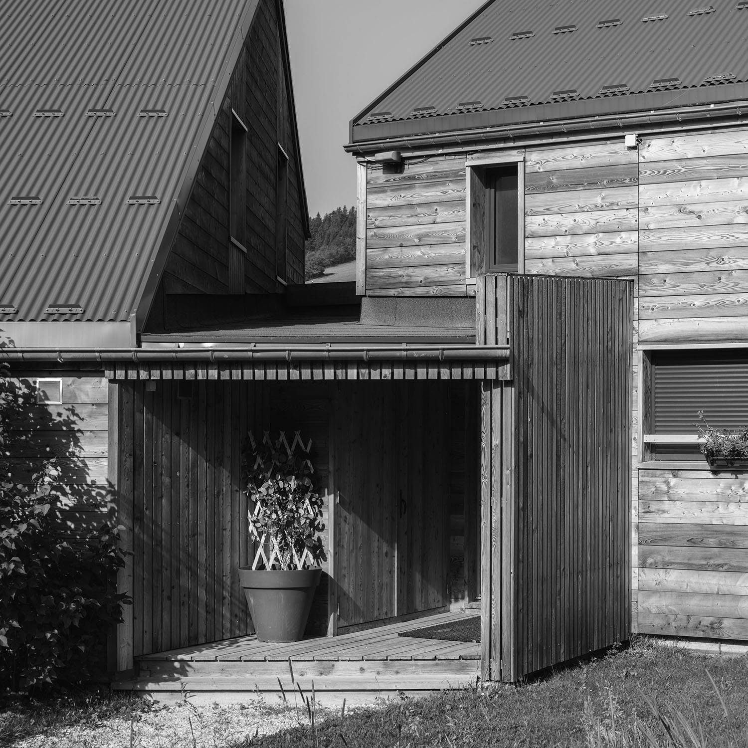 Détail d'une maison en ossature et bardage bois