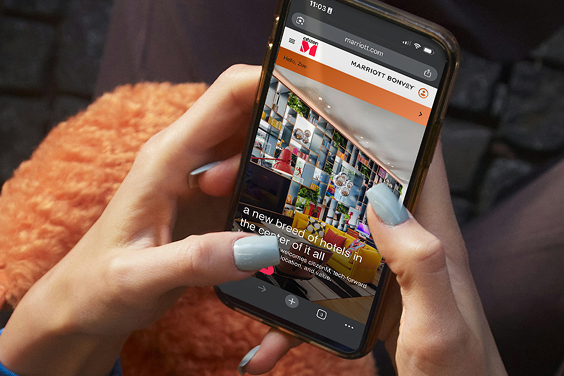 guest scrolling the citizenM website on a mobile phone