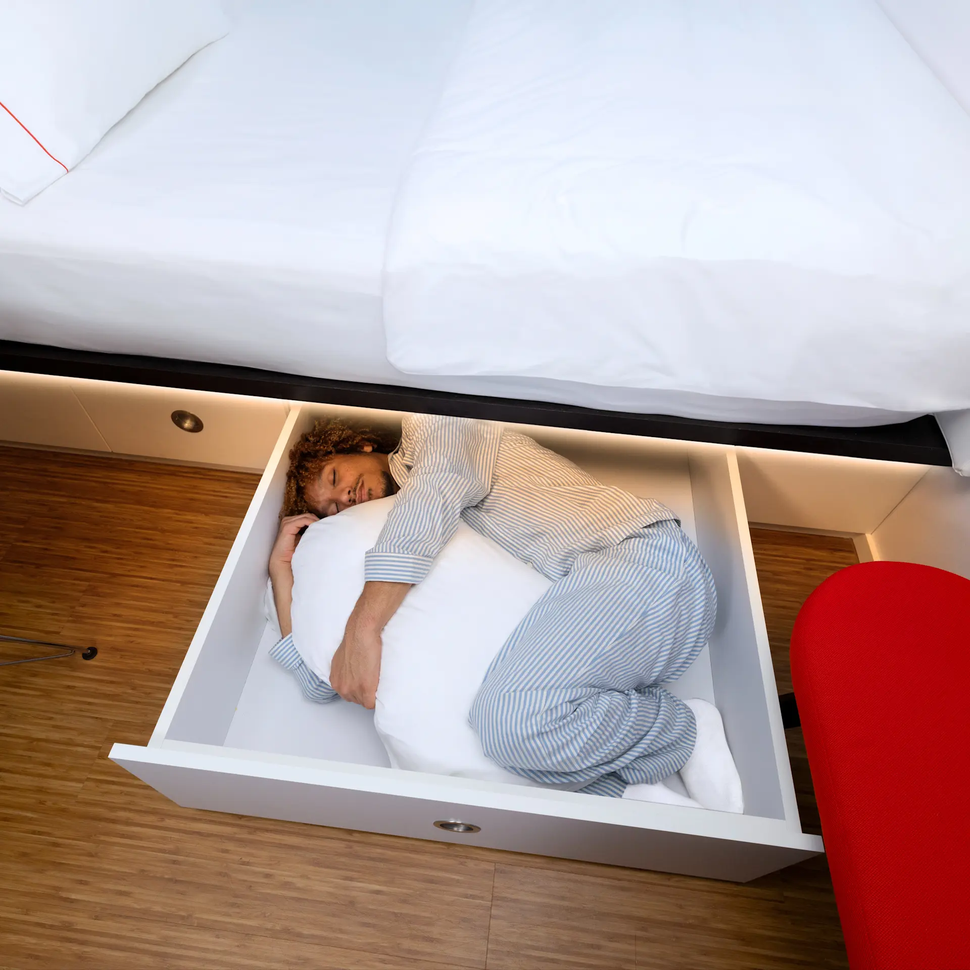 lifestyle shoot - guest in the luggage drawer