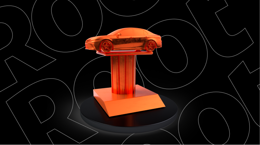Orange trophy with a small car on top