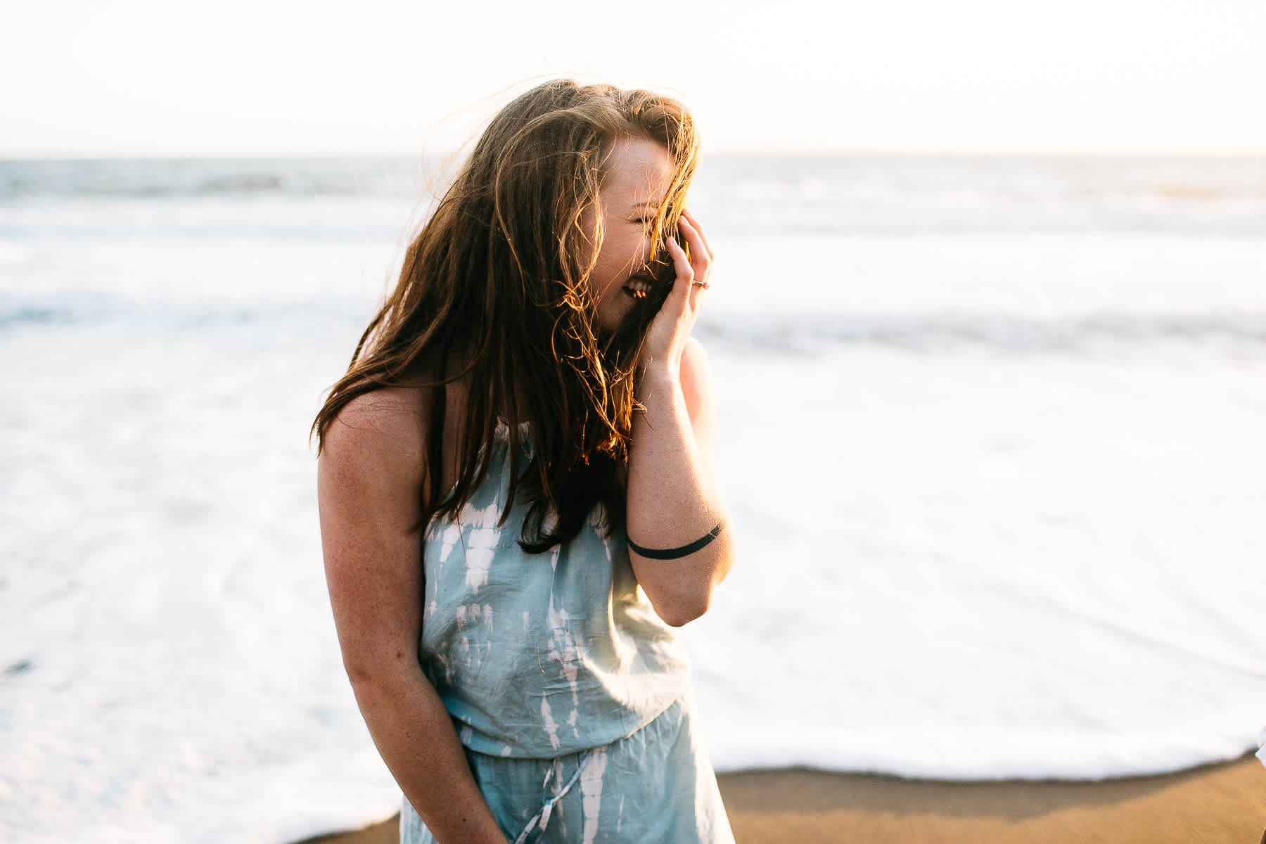 marin-headlands-rodeo-beach-lifestyle-laughter-engagement-session-57