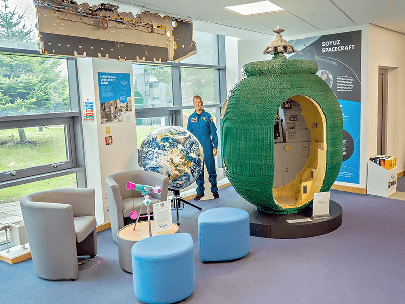 LEGO Soyuz capsule and cardboard Tim Peake banner at the NSLC