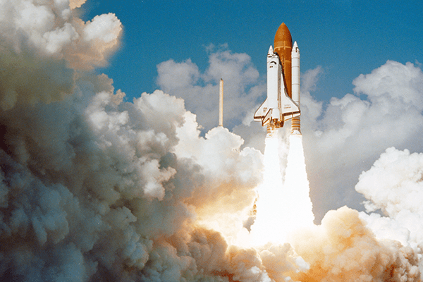 The Space Shuttle Challenger launching from Complex 39.