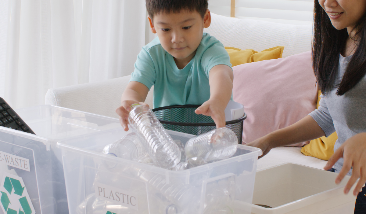 Child sorting recycling