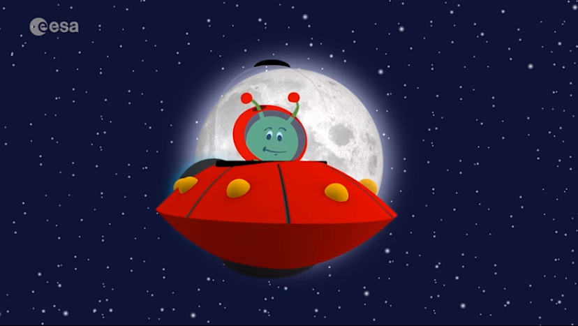 Cartoon alien in a spaceship smiles in front of a full moon.