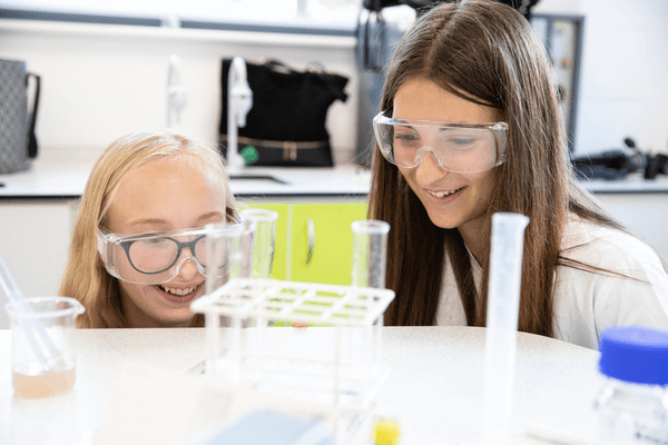 Two students studying chemistry at a STEM Club