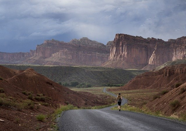 A runner training in the mountains