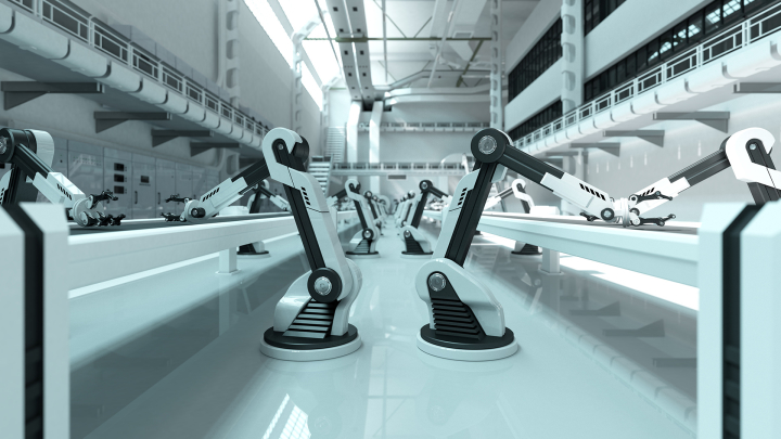 Lines of robots work in a factory.