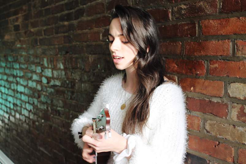 Brenda Emily with tiny guitar