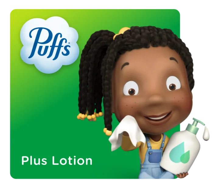 Puffs Pal Jordan holding a lotion bottle and Puffs Tissue
