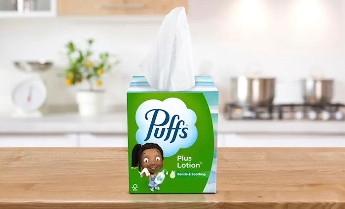 Puffs Plus Lotion on a kitchen counter