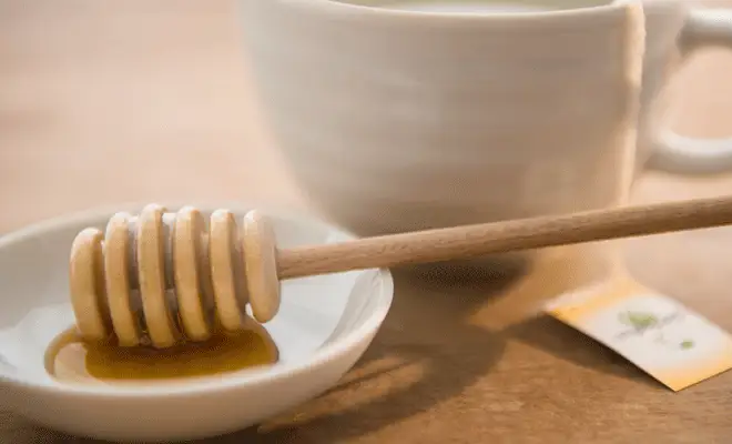 Tea and honey as remedy for sickness