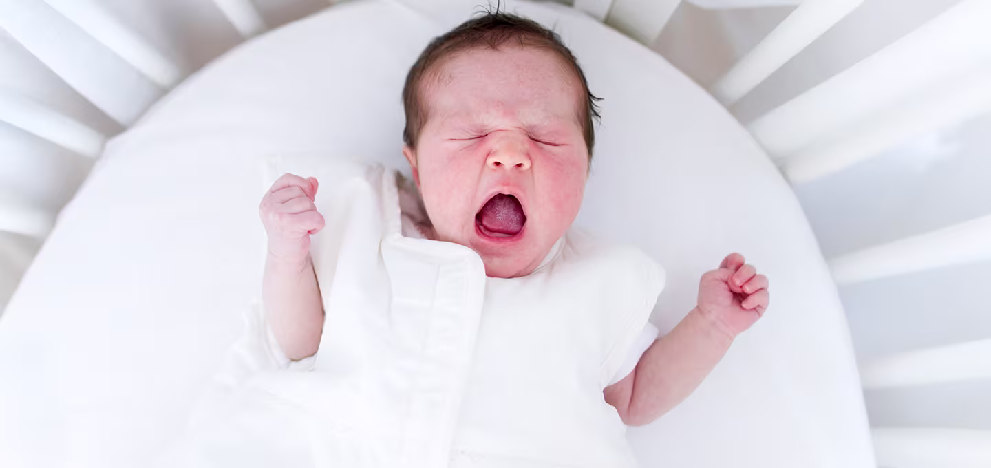 When do babies start sleeping through the night?