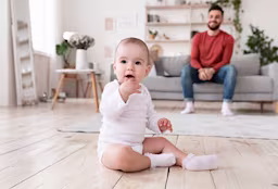 When do babies sit up?