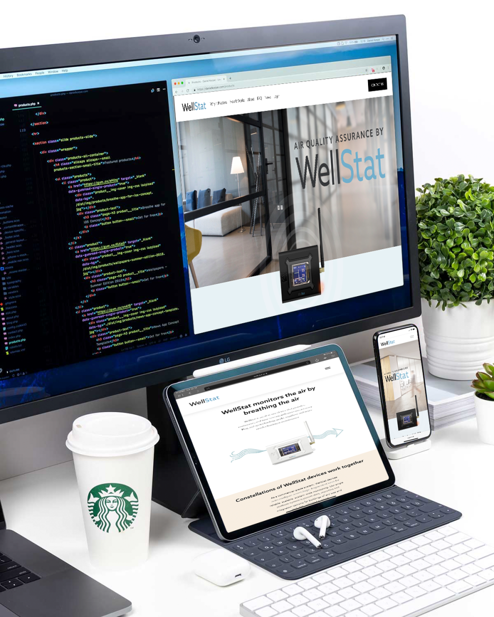 A monitor, laptop, and mobile device displaying a custom website we built for our client WellStat.