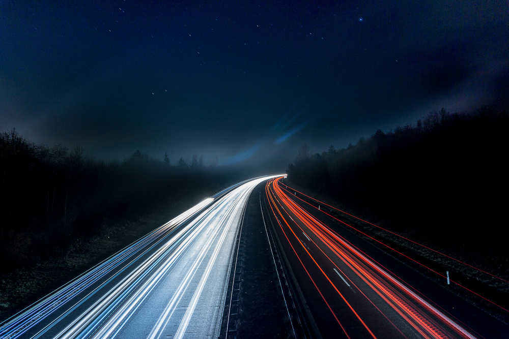 a time-lapsed image of cars on a freeway symbolizing the speed and performance of Jamstack-built websites