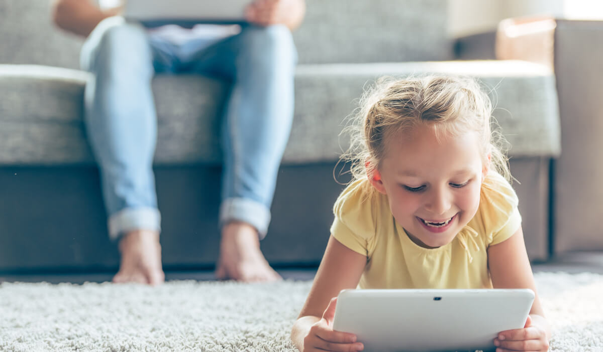 Parent on laptop checking emails