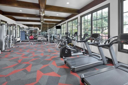 24-hour fitness center with cardio and strength equipment