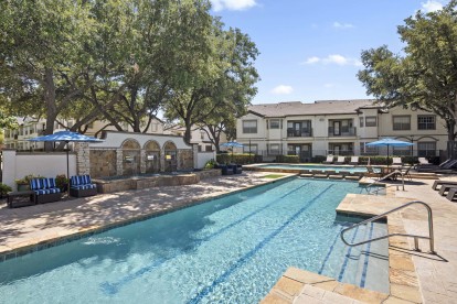 Resort-style pool with swim lanes at Camden Legacy Park apartments in Plano, TX