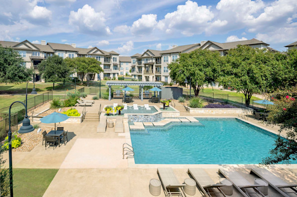 Resort-style pool and spacious sundeck at Camden Cedar Hills apartments in Austin, TX