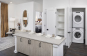Natural Modern Kitchen with Full-Size washer and dryer, and kitchen pantry at Camden NoDa in Charlotte North Carolina