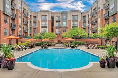 Resort style pool with lounge chairs at Camden College Park in College Park, Maryland