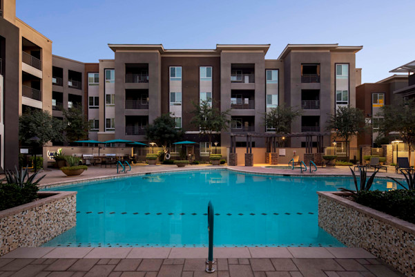 Pool with barbecues and outdoor dining areas