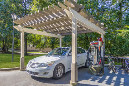 Car care center with industrial vacuum and hose