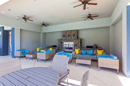 Outdoor resident lounge seating and fireplace 