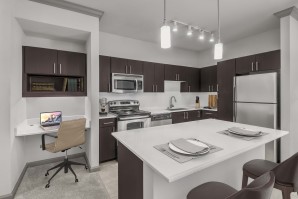 Large kitchen with built-in desk for work or study at Camden Asbury Village in Raleigh, NC