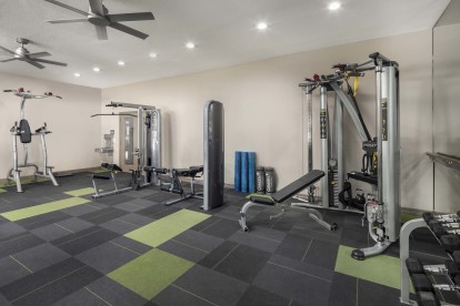 24-hour fitness center with strength machines at Camden Huntingdon apartments in Austin, TX