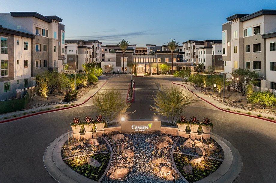 Community entrance and landscaped driveway at Camden North End.