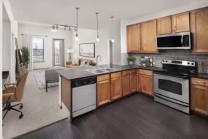 Two-bedroom kitchen with built-in desk at Camden Design District apartments in Dallas, TX