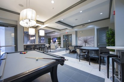 Midtown resident lounge with billiards poker tables kitchen and wifi