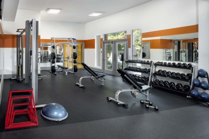 Expansive 3,000 square-foot fitness center with cardio, strength training, basketball court and yoga studio at Camden Overlook in Raleigh, NC