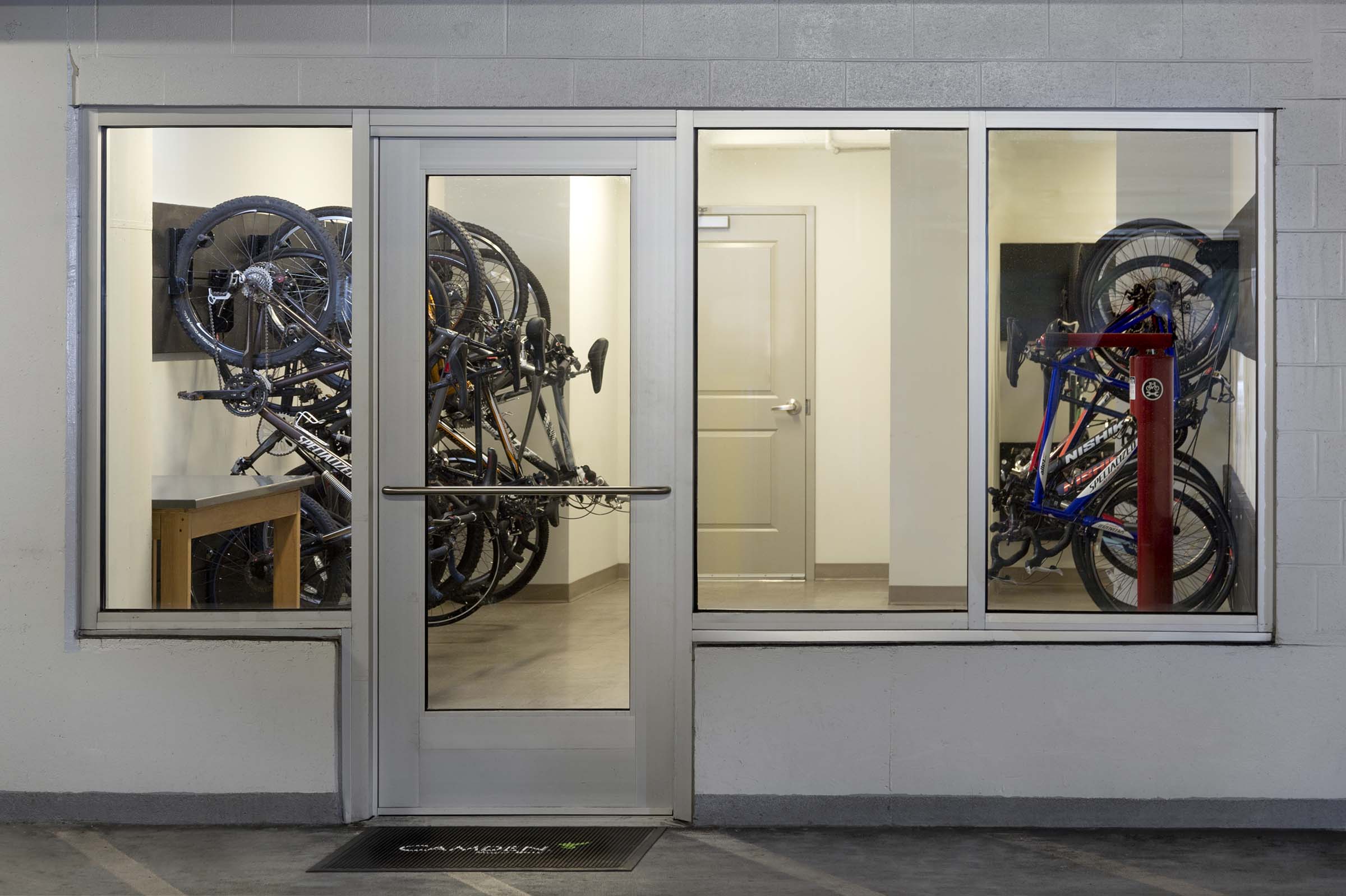 Enclosed bike storage room in the garage.