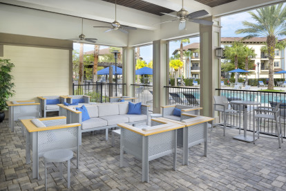 Poolside lanai at Camden Town Square apartments in Kissimmee, Florida. 