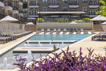 Resort-style pool with fountains at Camden Victory Park apartments in Dallas, TX