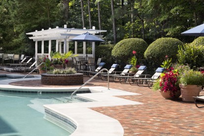 Relax by Camden Lake Pine's beautiful outdoor pool in Apex, NC