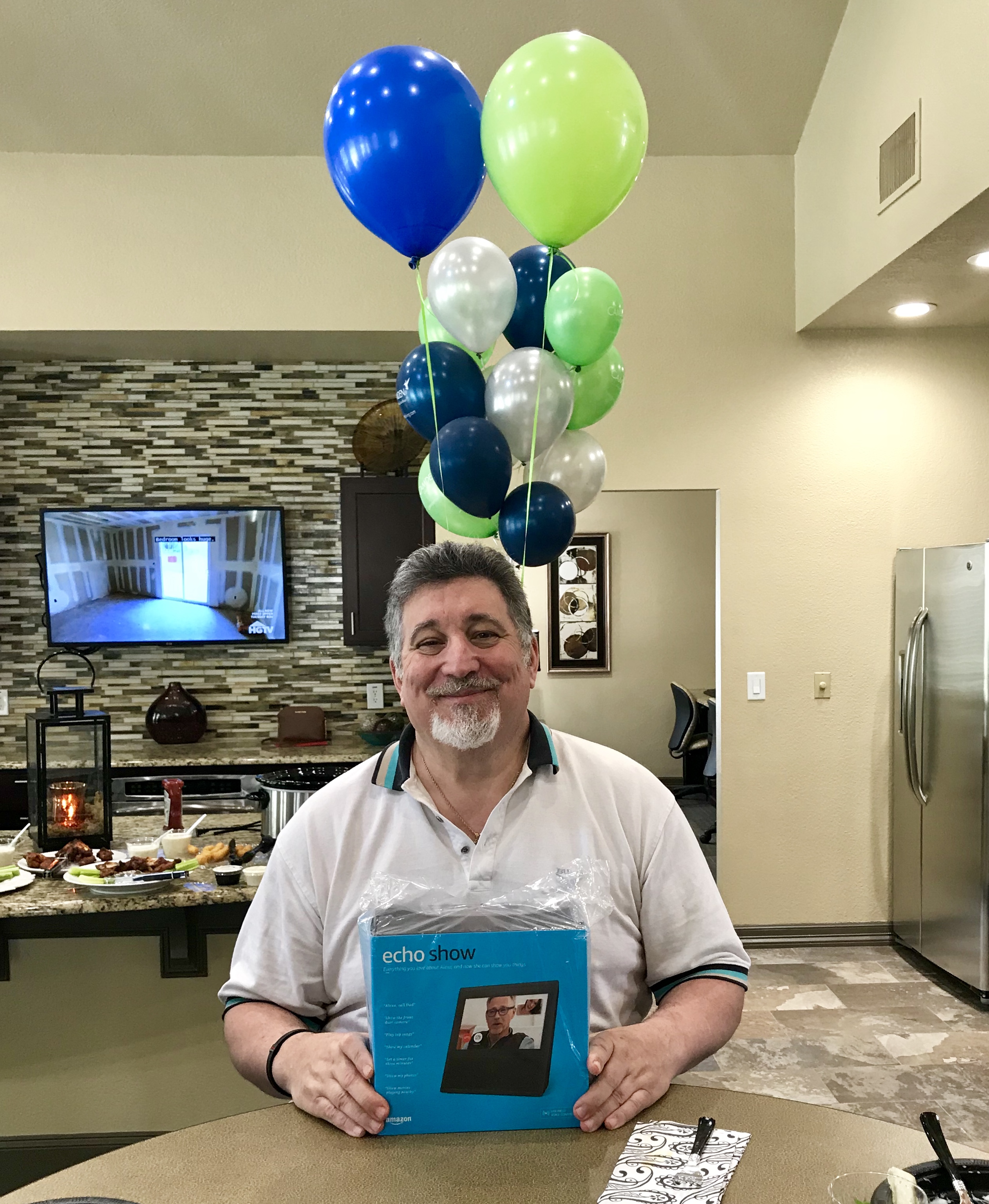 Big Jim opens his gift from his Camden Family, an Amazon Echo Show