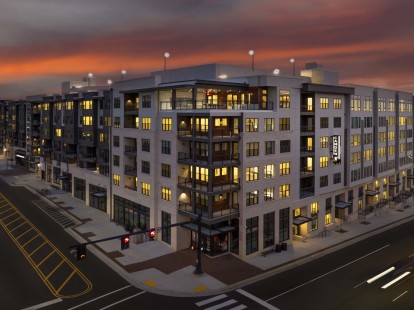 View of Roxboro St. and Dillard St. intersection with night view of Sky Lounge