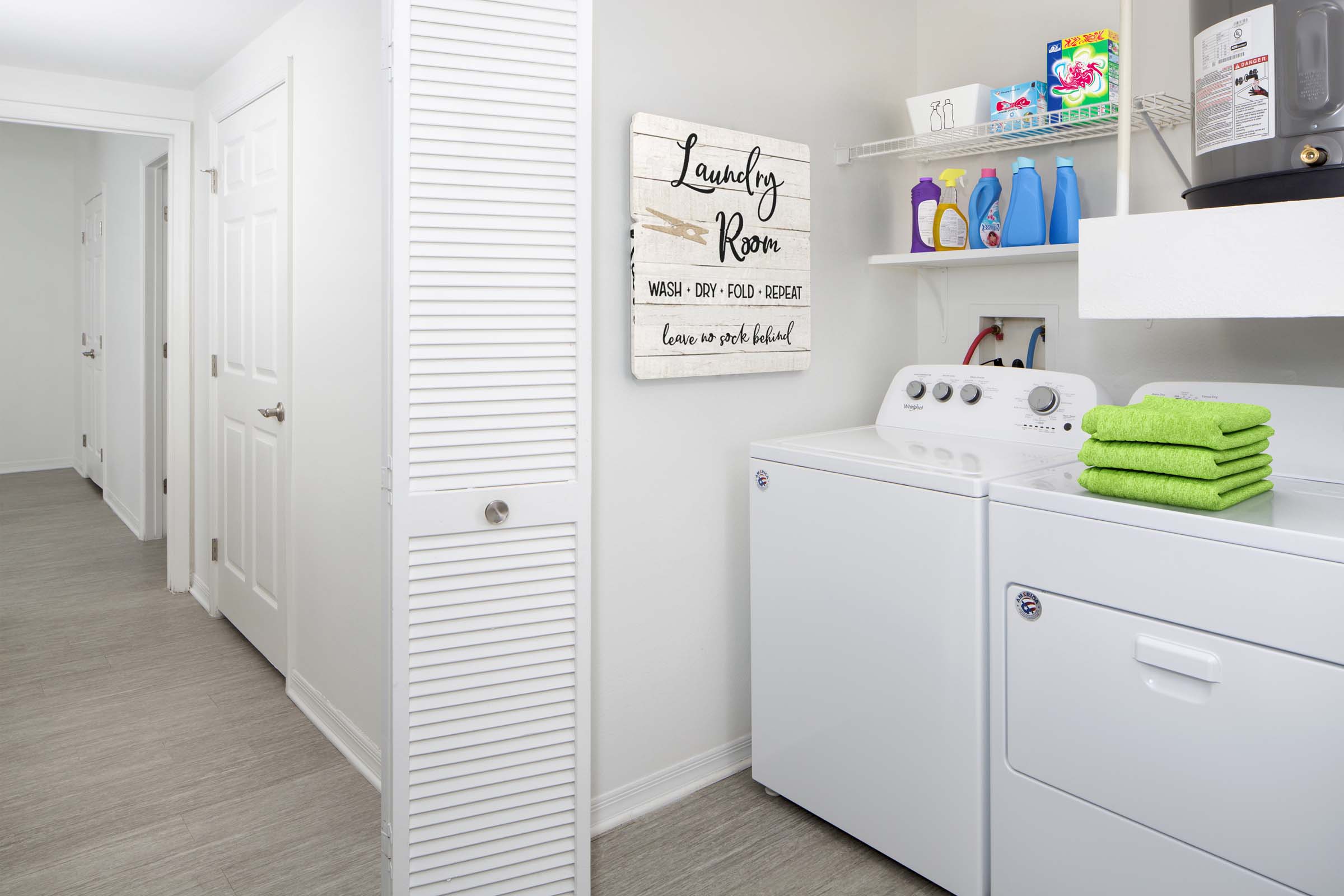 Laundry room with full size washer and dryer