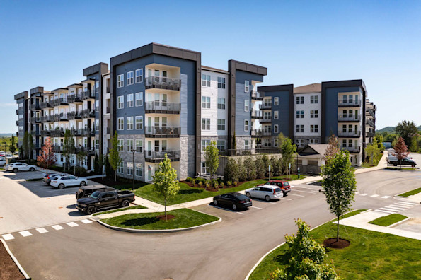 Exterior building view with parking in front at Camden West Nashville apartments in Nashville, TN