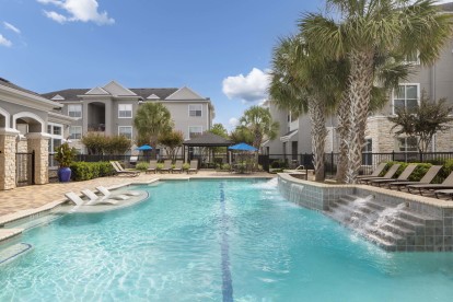 Resort-style pool with lap lane at Camden Spring Creek Apartments in Spring, Texas